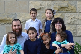 Rabbi David Hordiner ’95, with wife Nechama and their six kids.